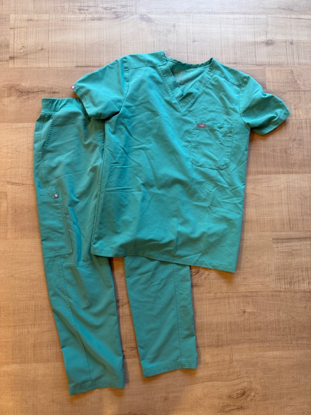 Figs Axim Cargo Scrub Pant and Leon Scrub Top in Surgical Green